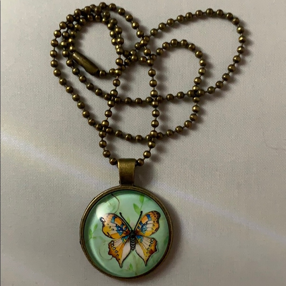 🦋 Butterfly medallion on bronze chain